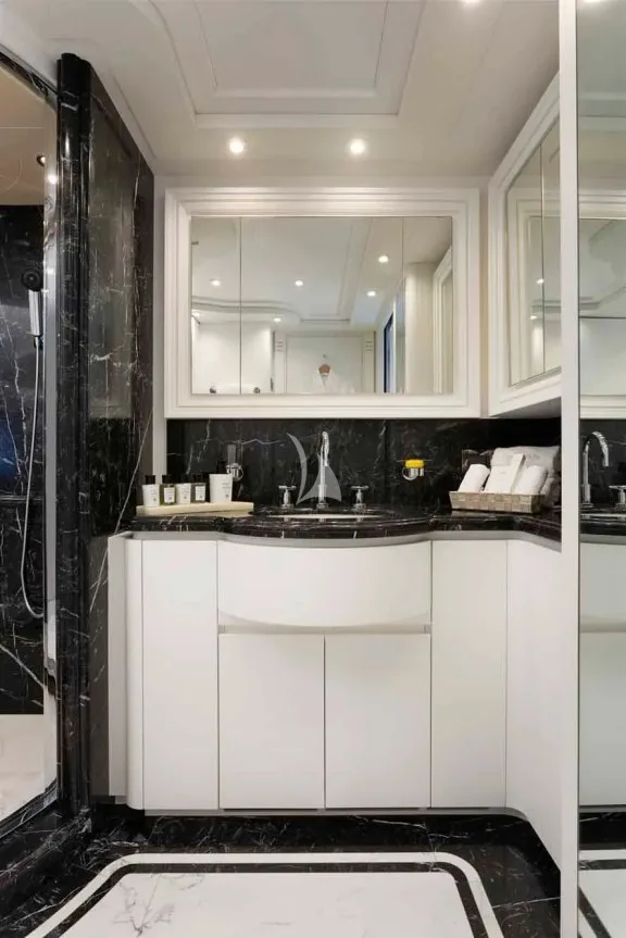 The exceptionally spacious en suite bathroom of the 2nd Master cabin (main deck) has 2 separate toiets, 2 sink units, 2 doors, a large shower & lots of stoarge space