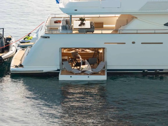 The spacious see through Beach Club with 2 large opening platforms on the sides and a door leading to the stern platfrom offers endless hours of fun and relaxation by the sea