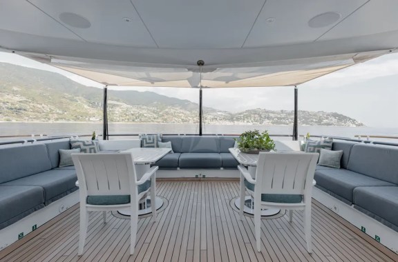 Aft deck seating- 2023 revised larger than shown tables that convert to dining