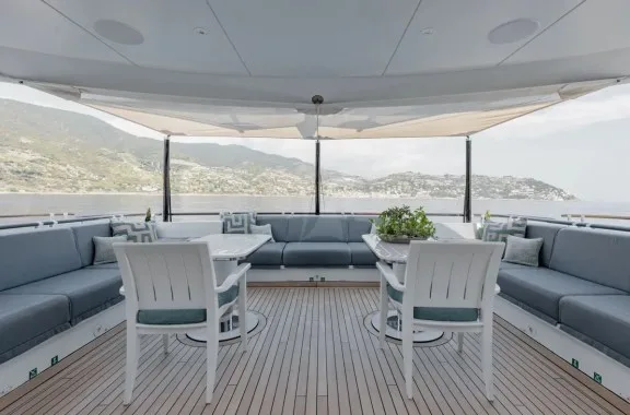Aft deck seating- 2023 revised larger than shown tables that convert to dining