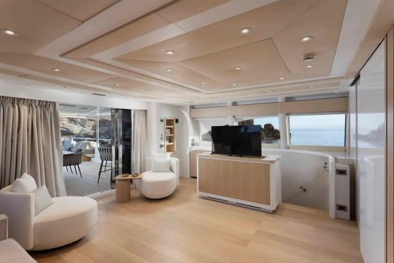 Pop Up TV of the salon of the 1st Master Cabin on Upper Deck. The upper deck has a large private veranda and the it can become a common area used by all guests if the Master cabin is separated with the sliding door. The salon sofa can be converted to a double bed, so the upper deck can sleep 4 guests.