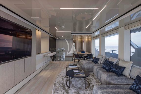 Bridge deck salon with 75 inch screen, bar and seating