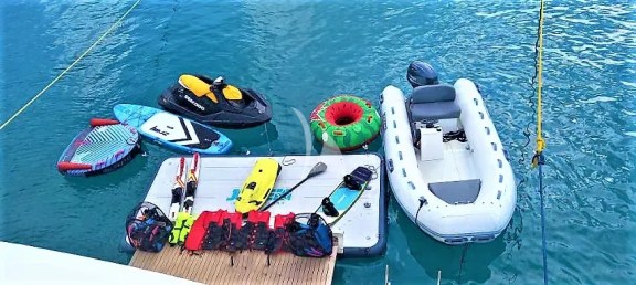 A large inflatable platform is joined (optionally) to the yacht's opening swimming platform - large variety of water toys