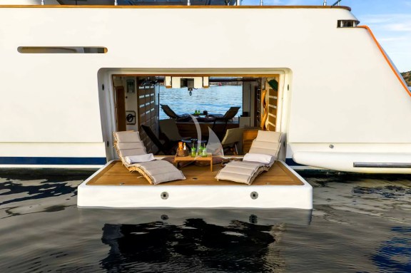 The spacious see through Beach Club with 2 large opening platforms on the sides and a door leading to the stern platfrom offers endless hours of fun and relaxation by the sea