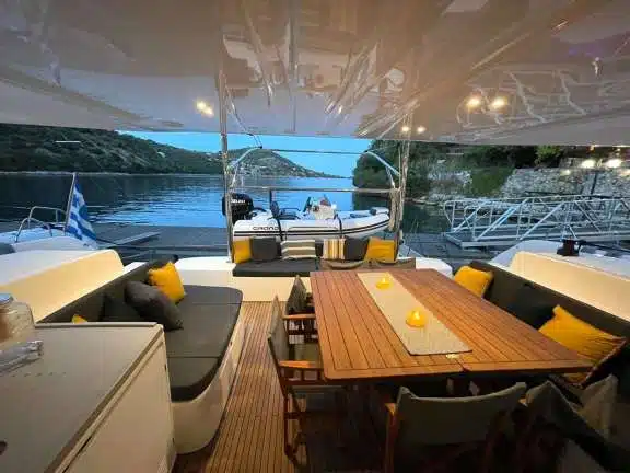 Cockpit area with custom designed large teak table