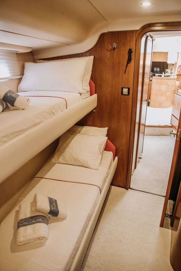 Twin cabin with upper & lower beds (available only for children)